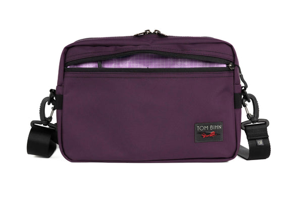 The Side Hustle in Aubergine Ballistic with Wisteria (pale purple) 210 Cerylon interior.